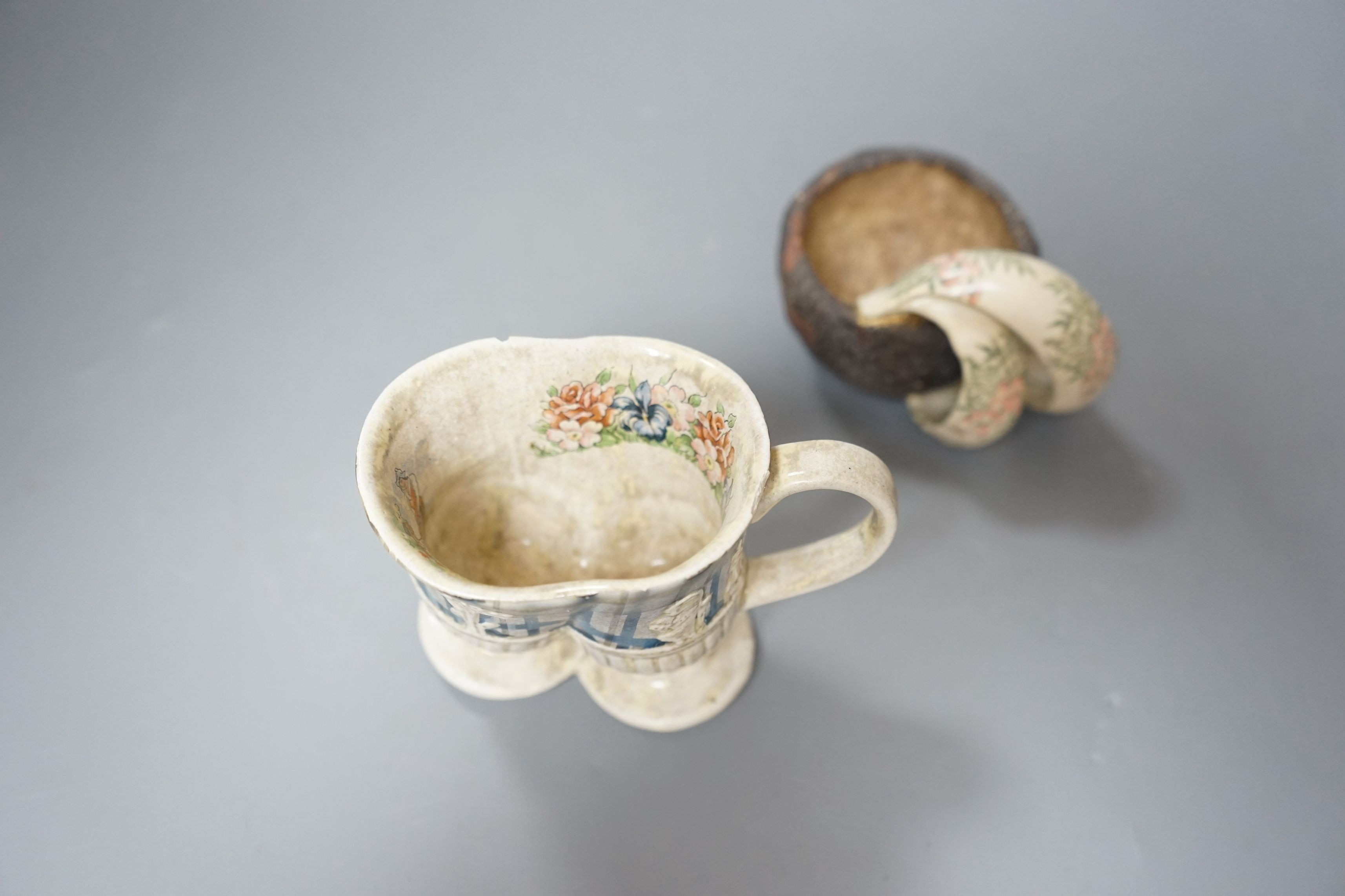 Carol McNicoll (b.1943), ‘Many a slip’ cup and another cup, with purchase receipt from Marsden Woo Gallery, 3 September 2015, tallest 10cm, (2)